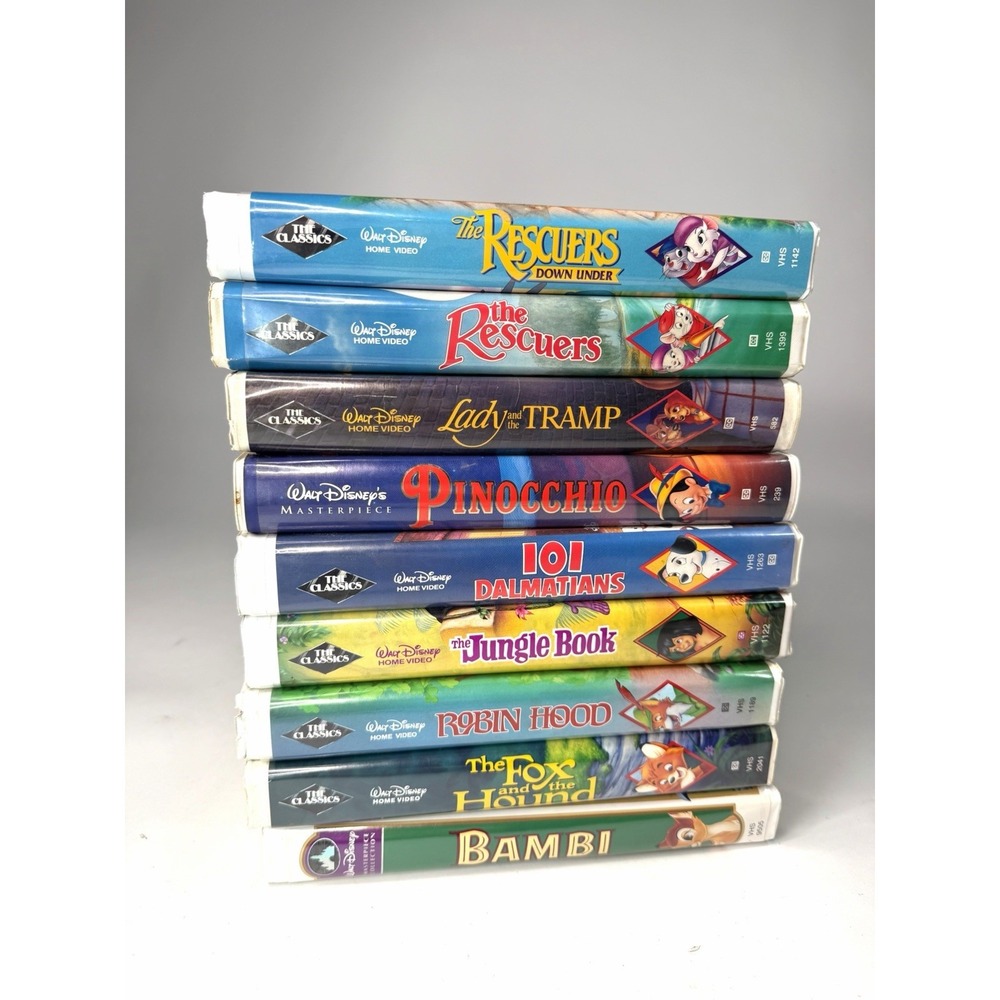 Lot Of 9 Vintage Disney VHS Clamshell Tapes Classic Masterpiece Robin Hood Bambi